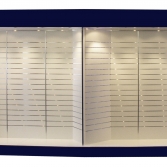 Slatboard wall with built in down lights
